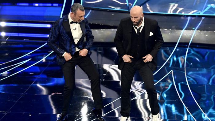 Polemica a Sanremo: Rai sospende pagamento a John Travolta