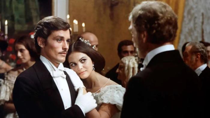 Claudia Cardinale assente al funerale di Alain Delon